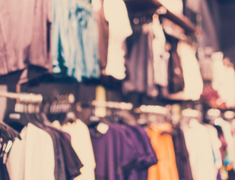 Vintage Style - blurred luxury clothing store in shopping mall